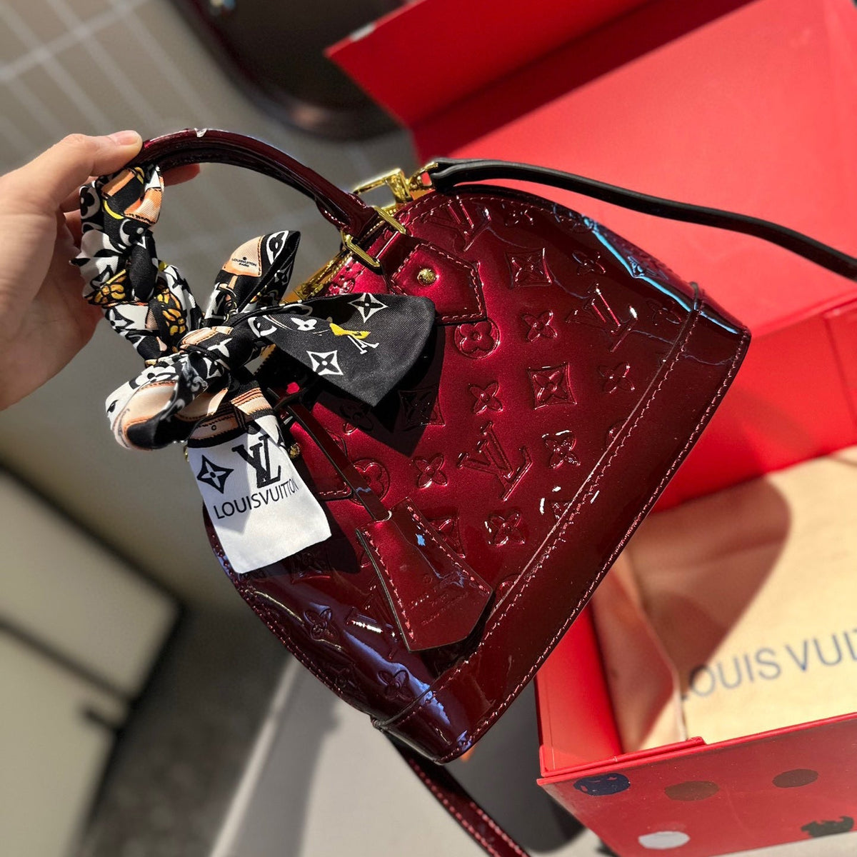 Embossed bright leather Alma shell bag 1824041702